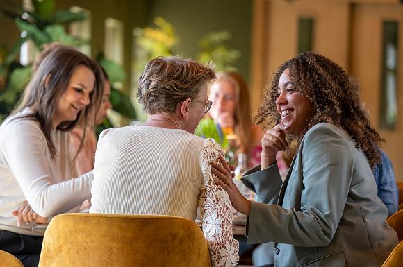 ladys networking at table in pub